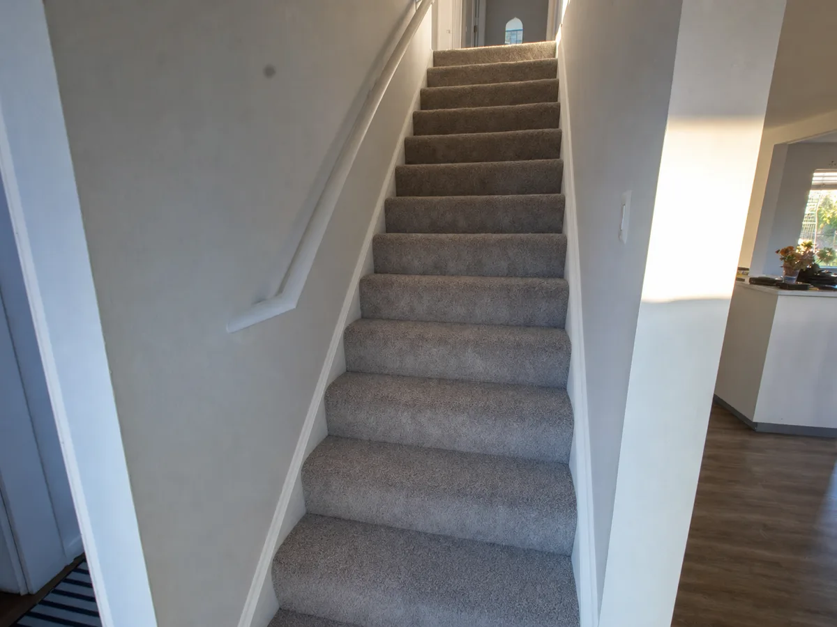 Freshly cleaned carpet with the furniture back in place — completed job in Tarzana, CA